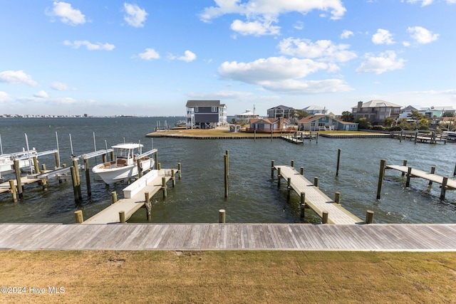 dock area with a water view