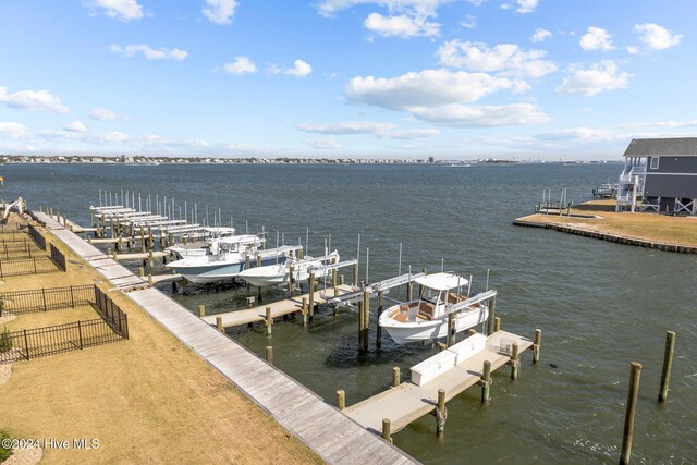 deck featuring a water view