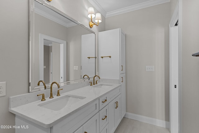 bathroom featuring vanity and crown molding