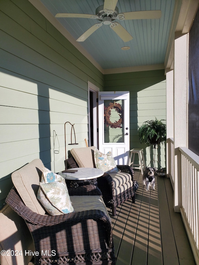 balcony featuring ceiling fan