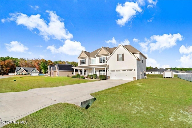 view of front of house featuring a porch, a garage, and a front lawn