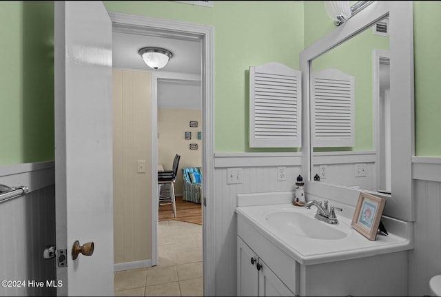 bathroom featuring vanity and tile patterned flooring