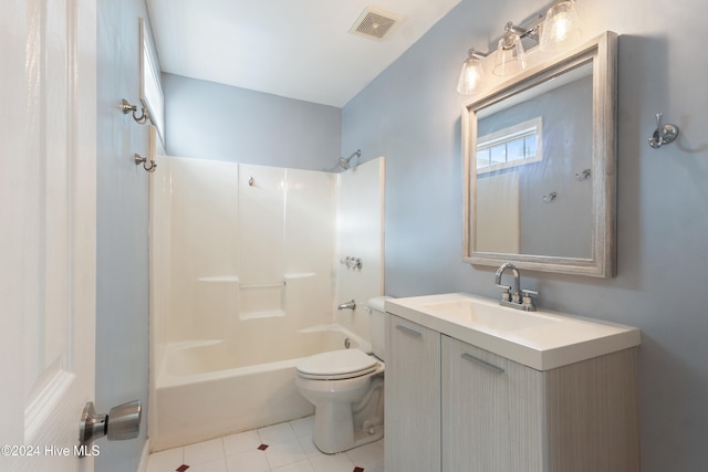 full bathroom with vanity, toilet, and  shower combination