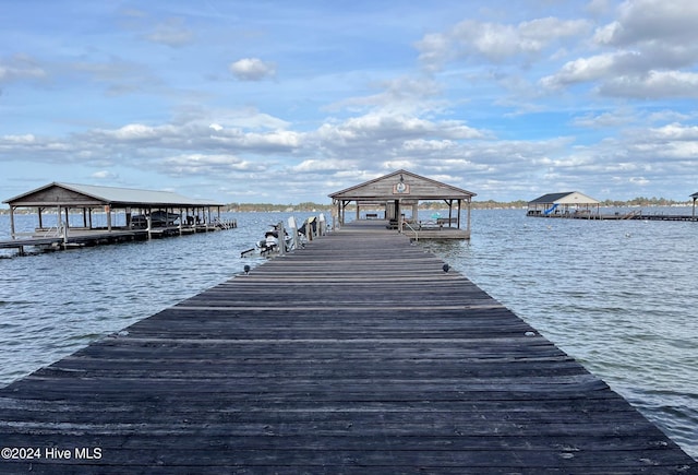 view of dock with a water view