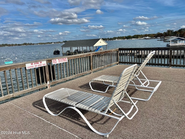 dock area with a water view