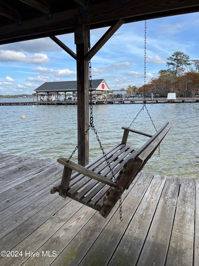 view of dock with a water view