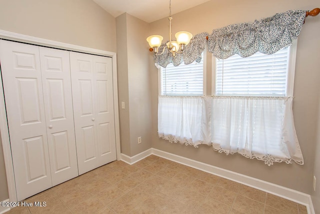 interior space featuring a chandelier