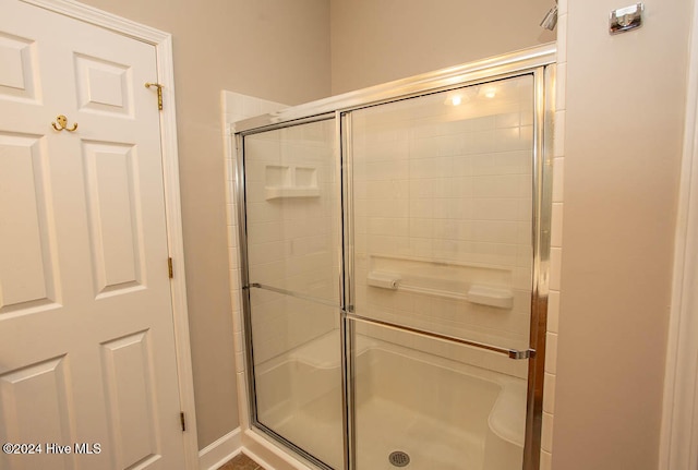 bathroom with an enclosed shower