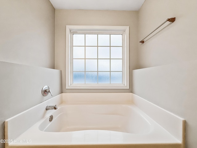 bathroom featuring a tub