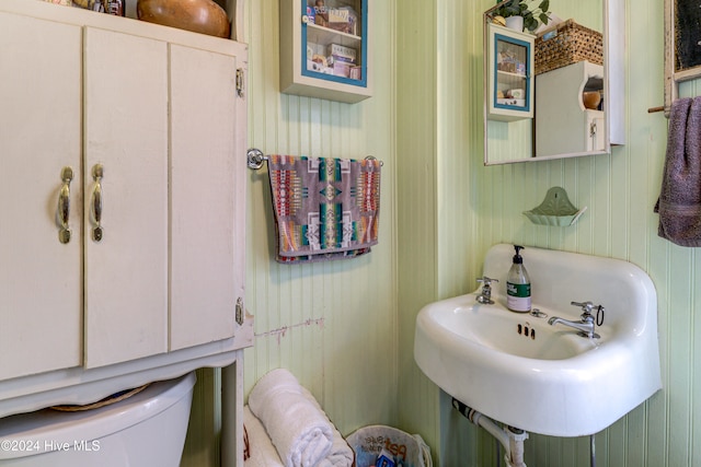 bathroom featuring sink and toilet