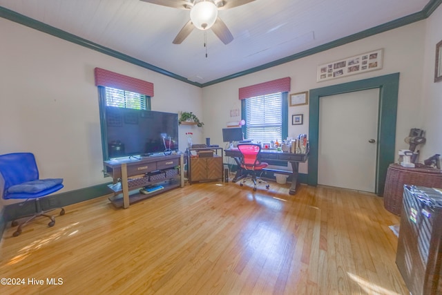 home office featuring ceiling fan, crown molding, and hardwood / wood-style floors