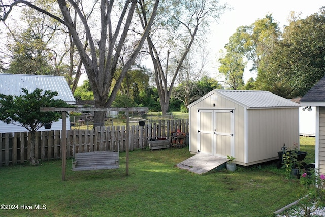 view of outdoor structure featuring a yard