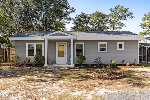 single story home with a front yard