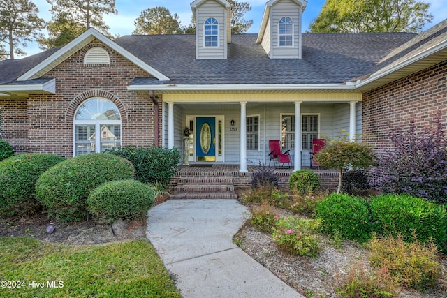 view of front of home featuring covered porch