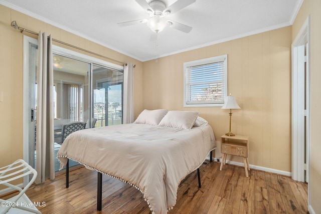 bedroom with ceiling fan, wood-type flooring, crown molding, and access to outside