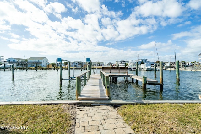 dock area with a water view