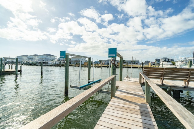 view of dock with a water view