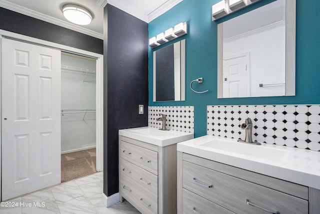 bathroom with vanity, crown molding, and tasteful backsplash