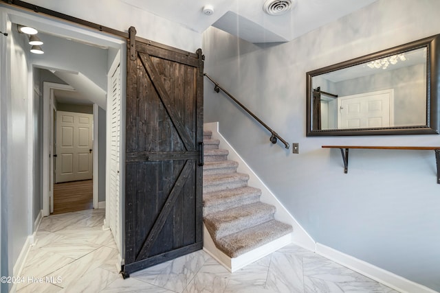 stairway with a barn door