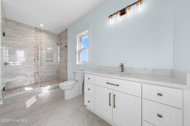 1405 Pinfish Ln, Carolina Beach, NC 28428 - full bathroom featuring toilet, a shower stall, vanity, and recessed lighting