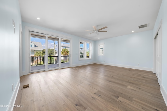 empty room featuring light hardwood / wood-style floors and ceiling fan