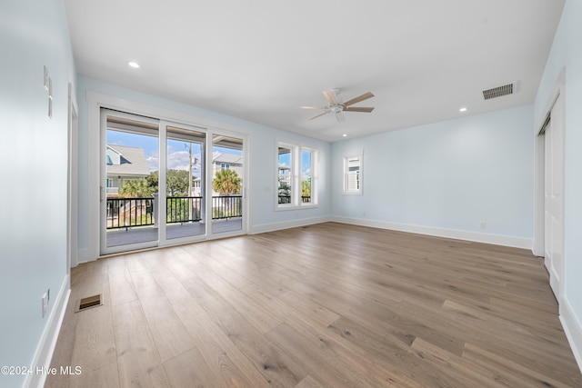 1405 Pinfish Ln, Carolina Beach, NC 28428 - unfurnished room featuring a ceiling fan, wood finished floors, baseboards, and recessed lighting
