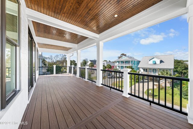 1405 Pinfish Ln, Carolina Beach, NC 28428 - wooden terrace featuring a residential view