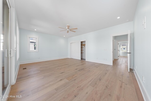 1405 Pinfish Ln, Carolina Beach, NC 28428 - unfurnished room featuring a ceiling fan, light wood-style flooring, baseboards, and recessed lighting