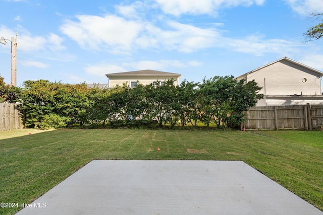 1405 Pinfish Ln, Carolina Beach, NC 28428 - view of yard with a patio