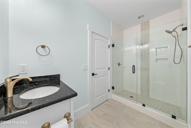 bathroom featuring vanity and walk in shower