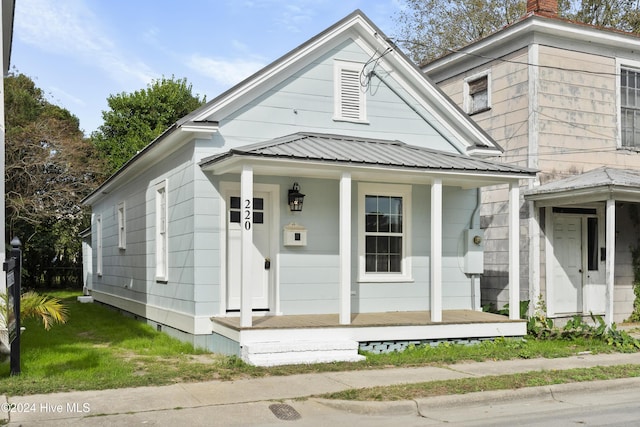 view of front of home featuring covered porch