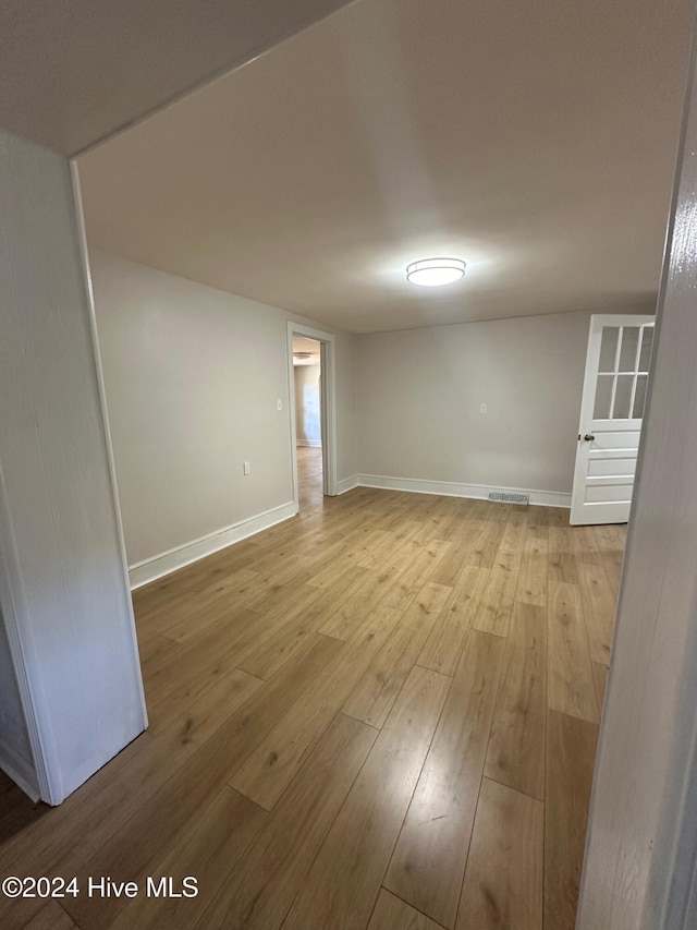 empty room featuring light hardwood / wood-style floors