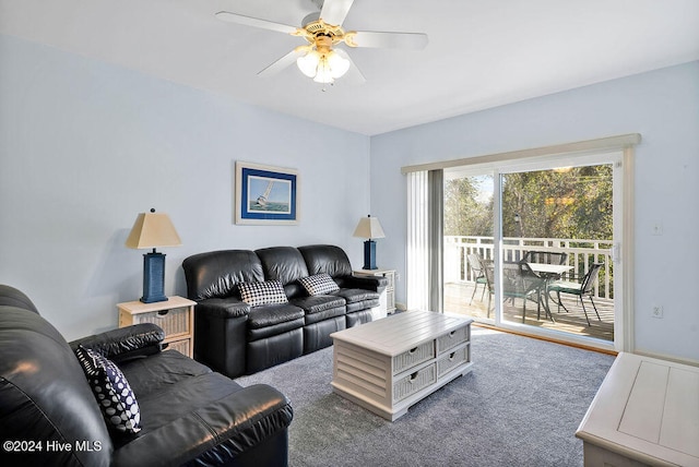 living room featuring carpet floors and ceiling fan