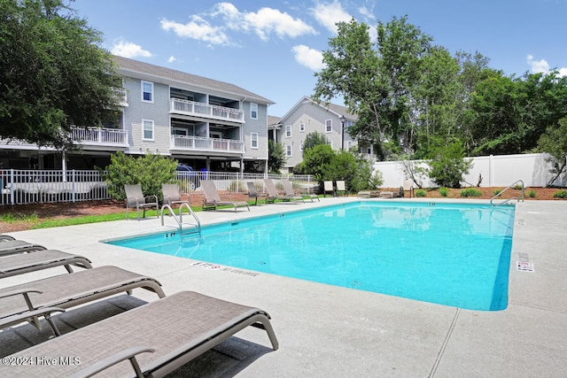 view of pool with a patio