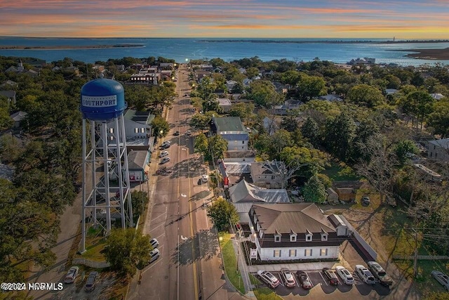 aerial view at dusk with a water view