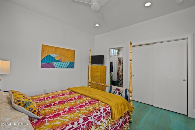 bedroom featuring ceiling fan, carpet flooring, and a closet