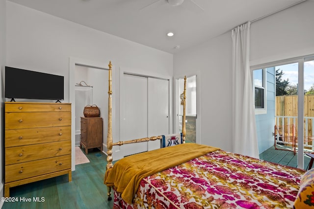 bedroom featuring access to outside, ceiling fan, and a closet