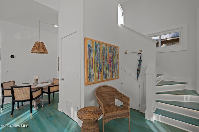 living area with hardwood / wood-style floors