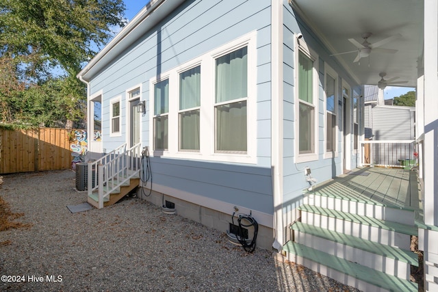 view of home's exterior featuring ceiling fan