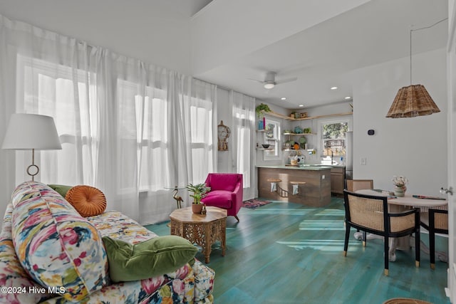 living room featuring ceiling fan