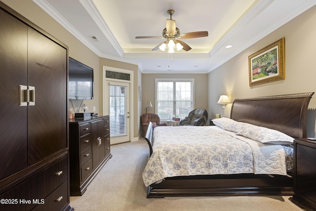 bedroom featuring ornamental molding, access to outside, a raised ceiling, ceiling fan, and light colored carpet