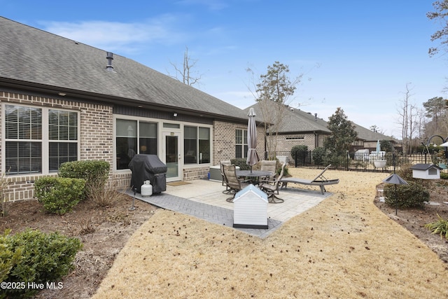 rear view of house featuring a patio