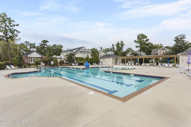 view of pool featuring a patio