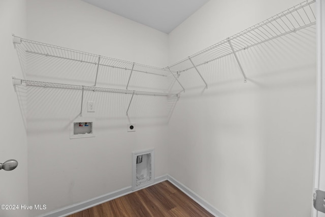 clothes washing area with washer hookup, dark hardwood / wood-style floors, and hookup for an electric dryer