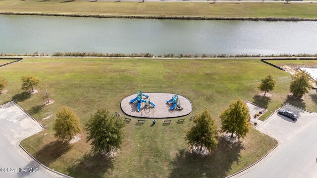 birds eye view of property featuring a rural view and a water view