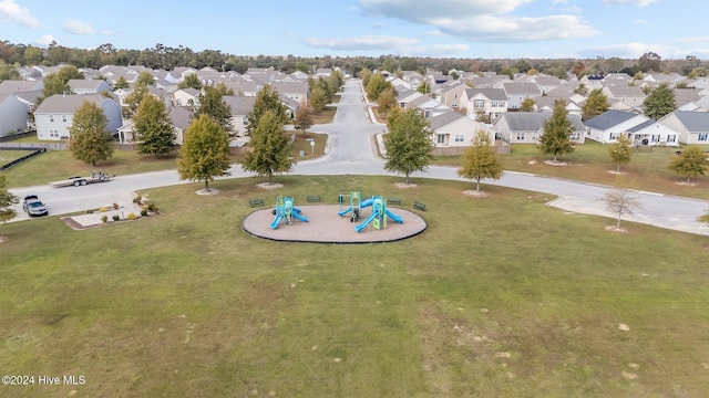 birds eye view of property with a residential view