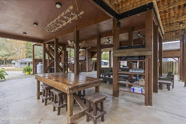 view of patio / terrace with ceiling fan