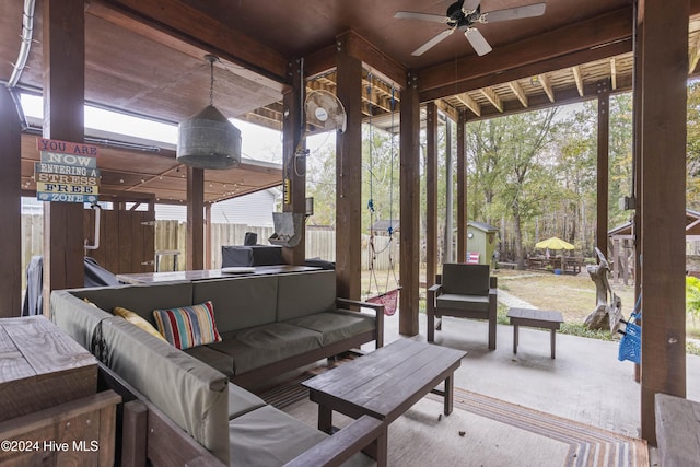 view of patio with outdoor lounge area and ceiling fan