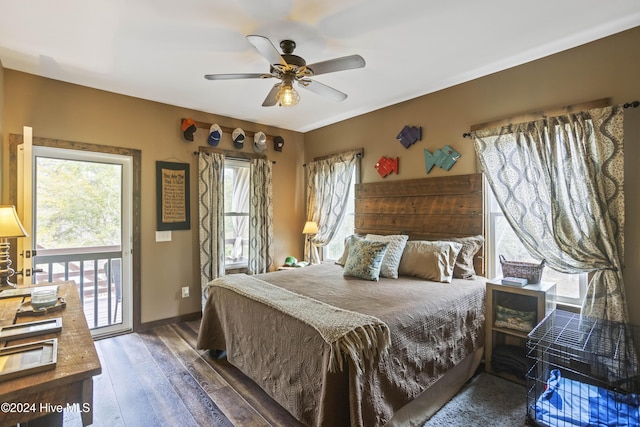 bedroom featuring dark hardwood / wood-style floors, ceiling fan, and access to exterior