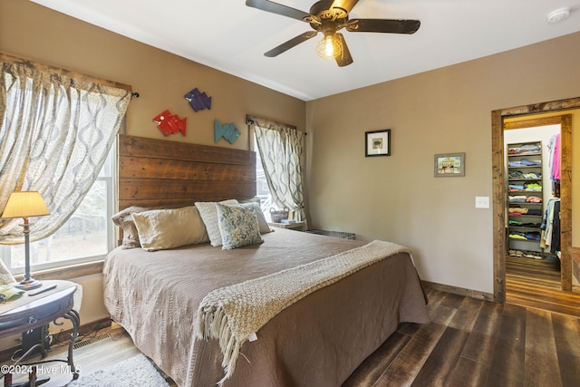 bedroom featuring hardwood / wood-style flooring and ceiling fan